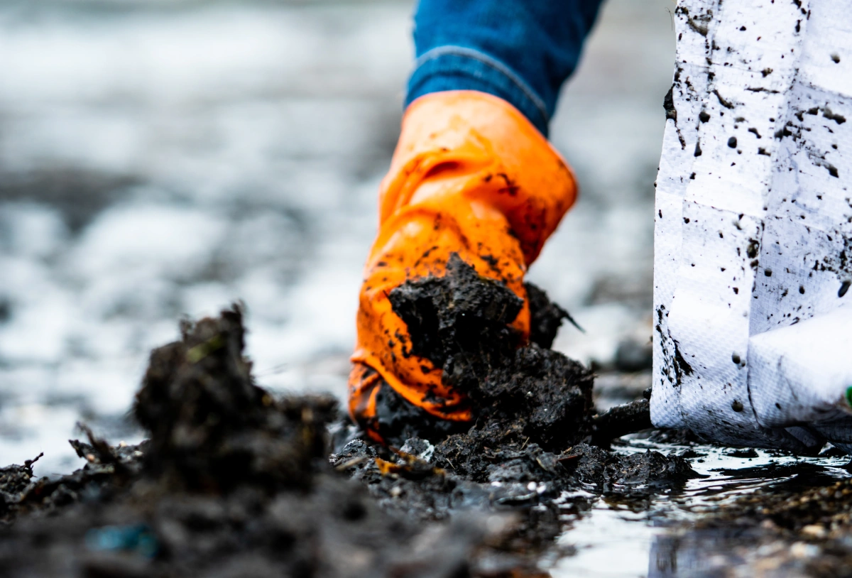 Sewage Cleanup Why This Is Not a DIY Job Certified technician performing professional sewage cleanup services after a home sewage backup